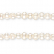 TQ Freshwater pearls round 5-6mm Ivory