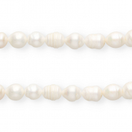 Imperfect freshwater pearls rice 12x10mm Natural White