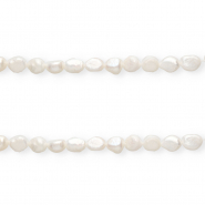 Imperfect freshwater pearls nugget oval 10x9mm Natural White