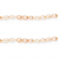 Imperfect freshwater pearls rice 4-7x4-5mm Peach Rose