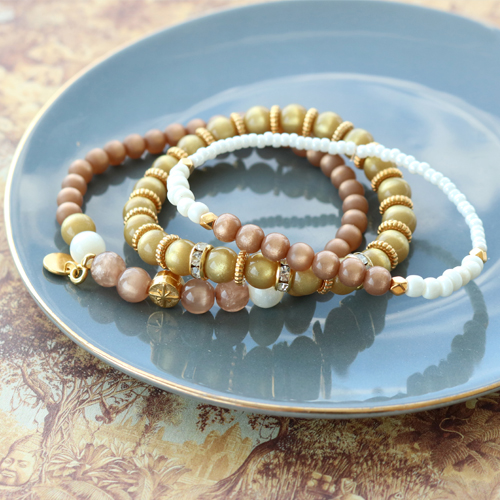 Amazing earrings and bracelets in warm colours made of new Polaris Elements beads