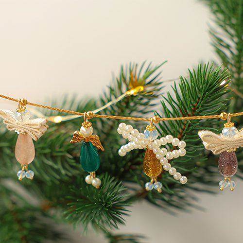 Create magical designs with Polaris drop shaped beads and angel details!