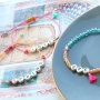 Quote jewellery with letter beads metal look and colourful details