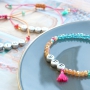 Quote jewellery with letter beads metal look and colourful details