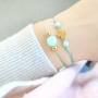 Jewellery with mint green Polaris Elements beads and golden details