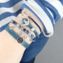 Bracelets and rings with anchors in blue shades