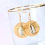 The cutest earrings and necklaces with shell pendants! 