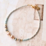 Colourful bracelets of faceted beads with golden details