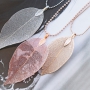 Delicate necklaces decorated with autumn leaf pendants 