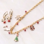 Cheerful Christmas jewellery with gold and silver Christmas charms