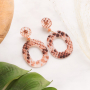 Handmade statement earrings + bracelets with snake print 