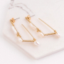 Create minimalist jewellery with freshwater pearls and gold coloured earring findings