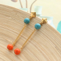 Create the greatest, ultra-summery earrings with ceramic beads!
