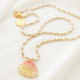 Necklaces and earrings with the latest collection of shell pendants: