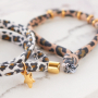 Make cute bracelets and hair elastics with stitched elastic ribbon leopard: