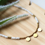 This trendy jewellery can be made with glass seed beads and stainless steel charms: