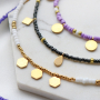This trendy jewellery can be made with glass seed beads and stainless steel charms: