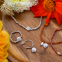 Create personalized bracelets with Birth Flower beads 
