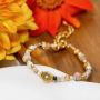 Create personalized bracelets with Birth Flower beads 