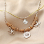 Ideas to create a beach look with metal beads and charms