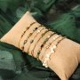 Create beautiful jewellery with glass beads with gold rim