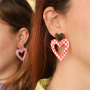 Create stylish earrings with resin pendants and stainless steel charms