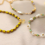 Get creative with oval glass beads with gold rim