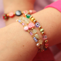 Get inspired! Making bead bracelets with a colourful twist.