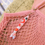 Decorate your accessories with our floral fish-shaped keychains