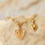 Create cheerful necklaces and bracelets with stainless steel heart charms