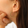 Tips for wearing statement stainless steel earrings