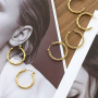 Tips for wearing statement stainless steel earrings