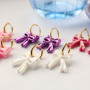 Jewellery inspiration with acrylic bow charms and heart earrings