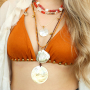 Get creative with large shell pendants and beads
