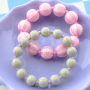 Create colourful jewellery with striped DQ acrylic beads