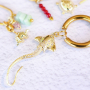 Inspiration with brass charms and summer details