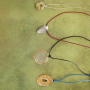 Inspiration with leather cord & statement charms