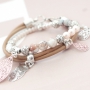 Trendy bracelets and earrings with Bohemian charms and fashionable beads
