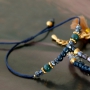 Jewellery set in a classy royal blue colour mixed with DQ metal gold