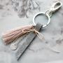 Look even better with your keys by mixing them with our fun tassels and mega trendy findings