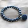 Stylish jewellery with acrylic beads and diverse stringing materials in dark tones like blue and anthracite. 