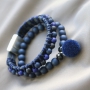 Stylish jewellery with acrylic beads and diverse stringing materials in dark tones like blue and anthracite. 