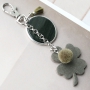 Design trendy keychains with new DQ leather pendants in clover shape 