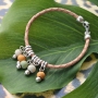 Get creative! Wooden beads with a twist in combination with DQ European leather and DQ European metal